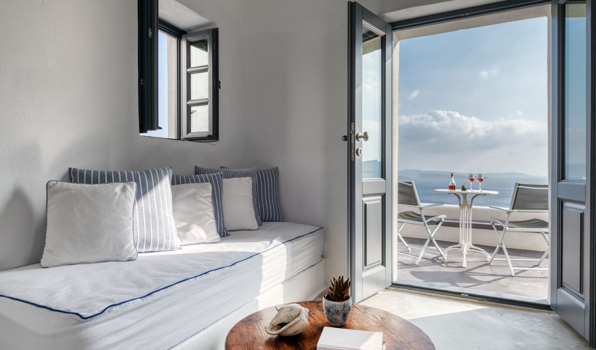 The interior of the luxury suite of Nostos Apartments in Oia Santorini